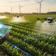 Ilustrasi penerapan teknologi smart farming berbasis IoT dengan drone dan sensor digital.